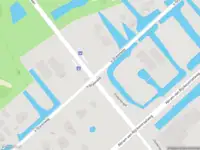 Ambulance met grote spoed naar de 's-Gravenweg in Capelle aan den IJssel