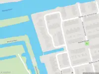 Ambulance met gepaste spoed naar de Nellie van Kolstraat in Zaandam