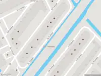 Ambulance met grote spoed naar de De Trompet in Heemskerk