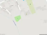 Brandweer met grote spoed naar de Spoorlaan in Adorp vanwege gebouwbrand