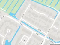 Ambulance met grote spoed naar de De Vang in Alblasserdam