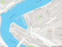 Ambulance met gepaste spoed naar de Disselkade in Haarlem