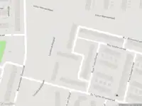 Ambulance met grote spoed naar de Koen Limpergstraat in Amsterdam