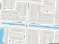 Politie met grote spoed naar de Scherwolderhemstraat in Sneek vanwege personen te water