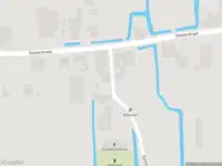 Ambulance met grote spoed naar de Kerkelaan in Benningbroek