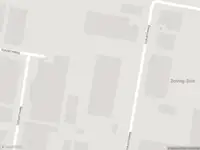 Ambulance met grote spoed naar de Industrieweg in Vuren