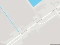 Ambulance met gepaste spoed naar de Oranjepolderweg in Maasdijk