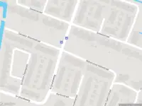 Ambulance met gepaste spoed naar de Steve Bikostraat in Haarlem