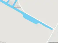 Brandweer met grote spoed naar de Oude Gracht in Veenhuizen vanwege een buitenbrand