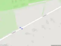 Brandweer met grote spoed naar de Naarderstraat in Laren vanwege gebouwbrand