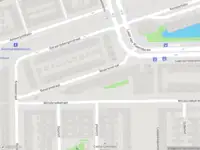 Ambulance met gepaste spoed naar de Beverenstraat in Amsterdam