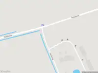 Ambulance met gepaste spoed naar de Kadijksweg in Den Burg