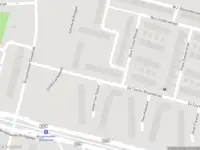 Ambulance met grote spoed naar de Burgemeester Fockstraat in Amsterdam