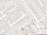 Ambulance met grote spoed naar de Drouwenstraat in 's-Gravenhage