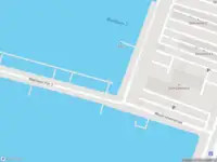 Ambulance met grote spoed naar de Woudrichemstraat in Rotterdam