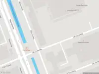 Ambulance met grote spoed naar de J.W. Lucasweg in Haarlem