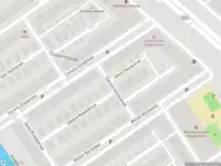 Ambulance met grote spoed naar de Edmund Gunterstraat in Amsterdam