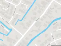 Ambulance met grote spoed naar de Brugstraat in Obdam