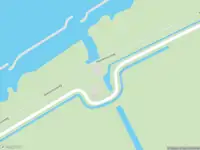 Politie met grote spoed naar de Heerenhuisweg in Hellum vanwege voertuigen te water