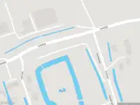 Ambulance met gepaste spoed naar de Lekdijk in Langerak