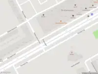 Ambulance met grote spoed naar de Karspeldreef in Amsterdam