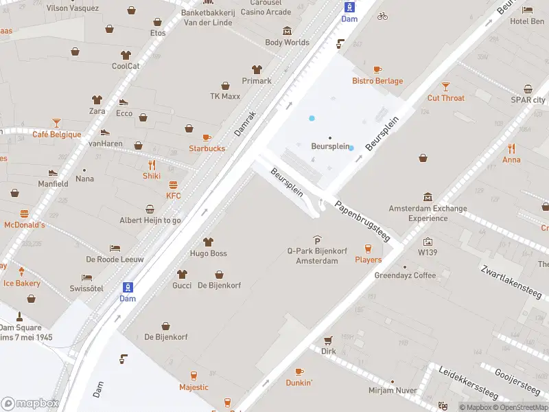 Ambulance met gepaste spoed naar de Beursplein in Amsterdam