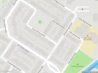 Ambulance met gepaste spoed naar de Lotte Beesestraat in Leiden