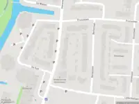 Ambulance met grote spoed naar de Munnikenweg in Alkmaar