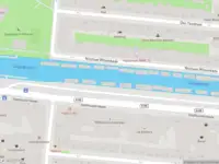 Ambulance met grote spoed naar de Weteringstraat in Amsterdam