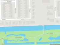 Ambulance met grote spoed naar de Genhoes in Amsterdam