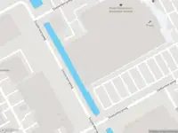 Ambulance met gepaste spoed naar de Schepenbergweg in Amsterdam