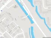 Ambulance met grote spoed naar de Watermanweg in Rotterdam