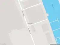 Politie met grote spoed naar de Industrieweg in Alphen aan den Rijn vanwege ongeval met letsel