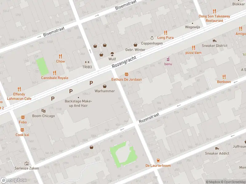 Ambulance met grote spoed naar de Eerste Rozendwarsstraat in Amsterdam