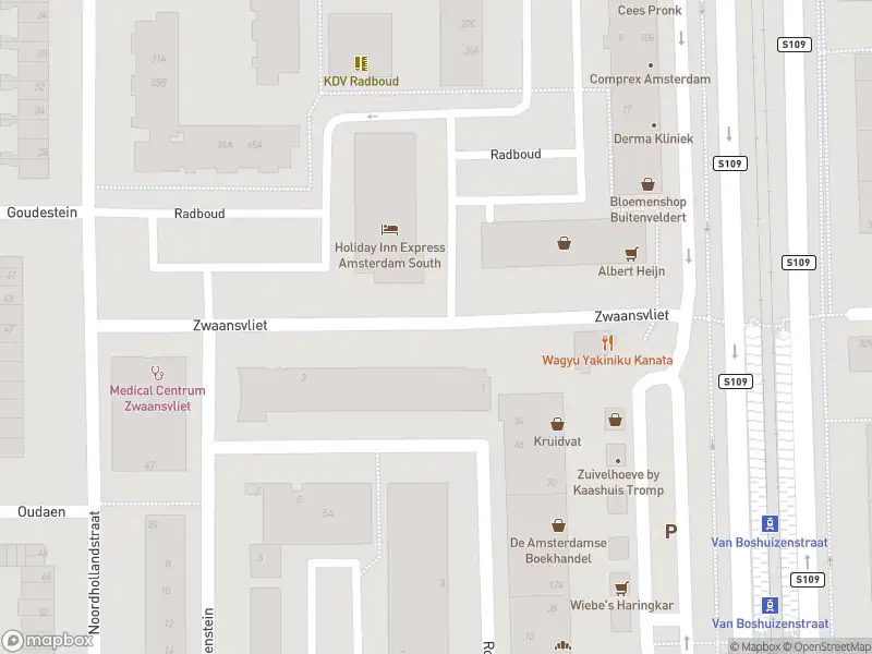 Ambulance met gepaste spoed naar de Zwaansvliet in Amsterdam