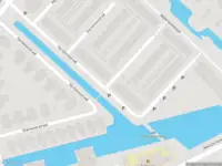 Ambulance met grote spoed naar de Veenwortelstraat in Rotterdam