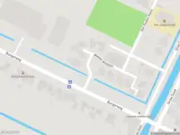 Ambulance met grote spoed naar de Meester Bollplein in Burgerbrug