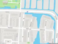 Ambulance met grote spoed naar de Roggetiende in Lekkerkerk