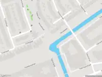 Ambulance met gepaste spoed naar de Tielstraat in Amsterdam