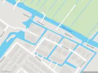 Ambulance met grote spoed naar de De Kreken in Alblasserdam