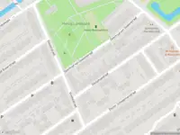 Ambulance met grote spoed naar de Stalpaert van der Wieleweg in Delft