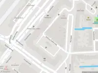 Ambulance met gepaste spoed naar de Stationsweg in Leiden