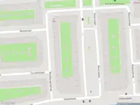 Ambulance met gepaste spoed naar de Courbetstraat in Amsterdam