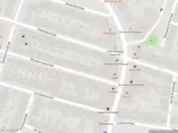 Ambulance met gepaste spoed naar de Van der Vinnestraat in Haarlem