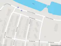 Ambulance met grote spoed naar de Rollostraat in Rotterdam