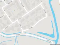 Ambulance met grote spoed naar de Duffelweg in Ouddorp vanwege gebouwbrand