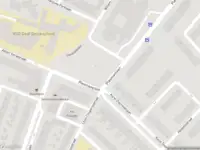 Ambulance met gepaste spoed naar de Van Nouhuysstraat in Haarlem