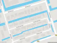 Brandweer met grote spoed naar de Barwoutswaarder in Woerden vanwege gebouwbrand