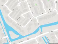 Ambulance met gepaste spoed naar de Nederrijn in Pijnacker