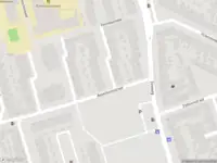 Ambulance met grote spoed naar de Olijfboomhof in IJmuiden